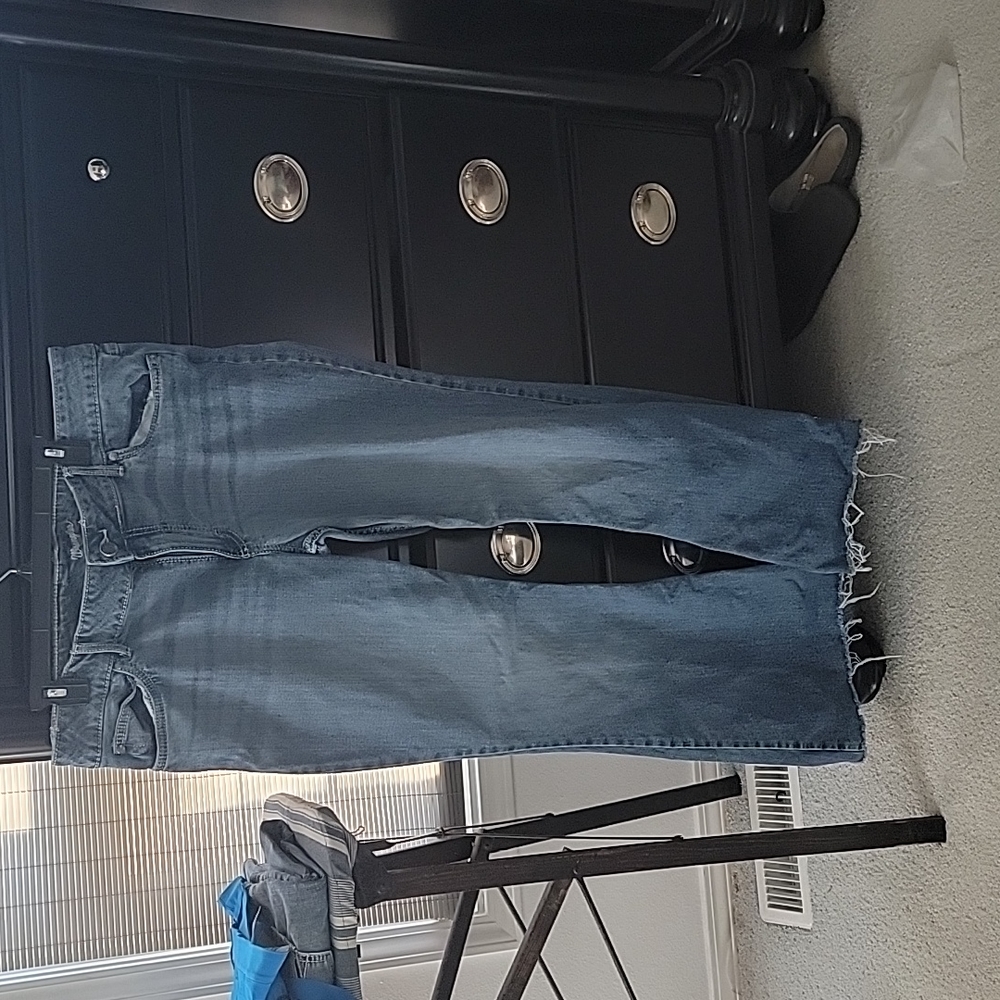 Women wrangler flare raw heam